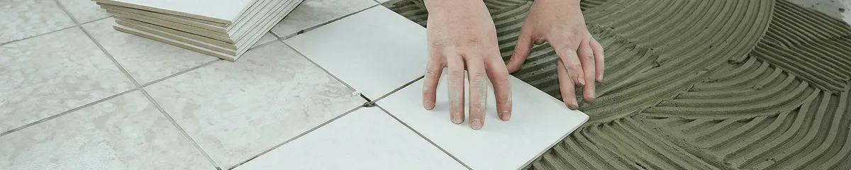 Professional installing white tile floors in Overland Park, KS